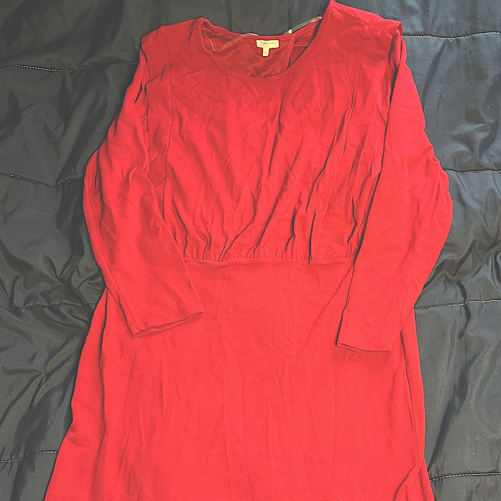 Signature knee length slim dress, long sleeve with back cut out.